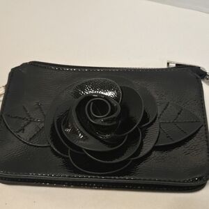 black small bag with flower